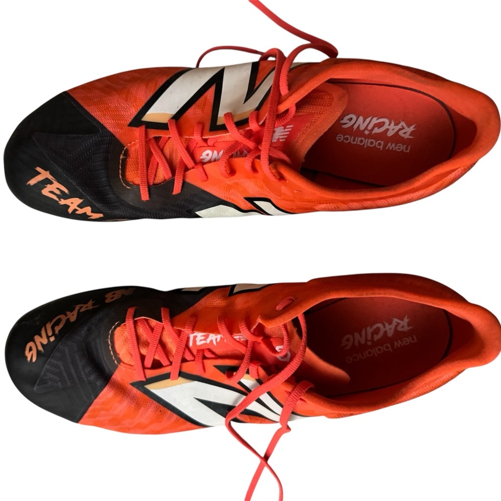 New Balance unisex SD100 v5 Black and Orange Athletic Shoes